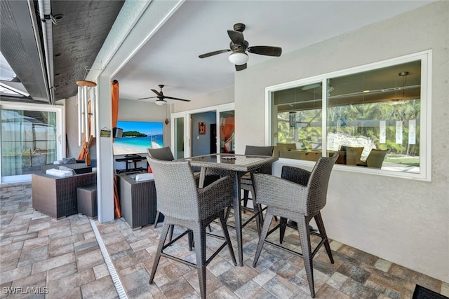 view of patio / terrace featuring an outdoor living space and ceiling fan