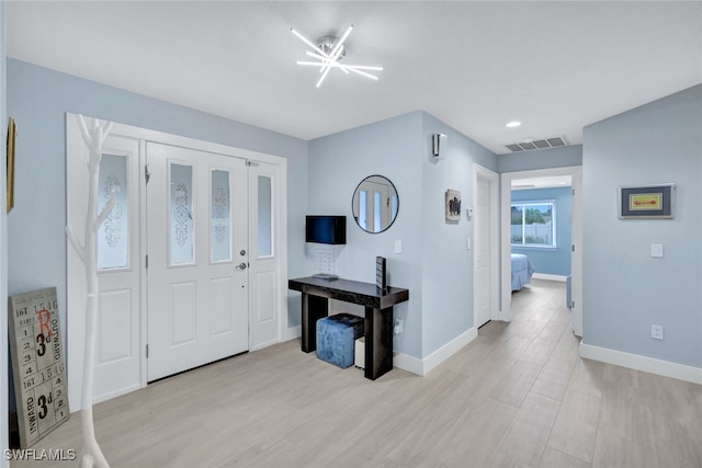 foyer featuring light wood-type flooring