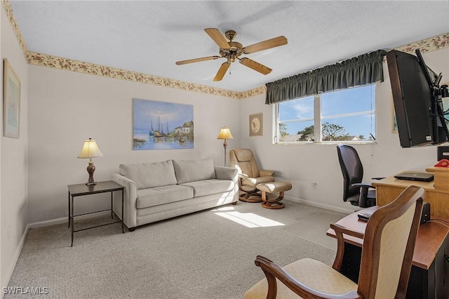 office with light carpet, a textured ceiling, and ceiling fan