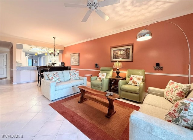 tiled living room featuring ceiling fan and crown molding