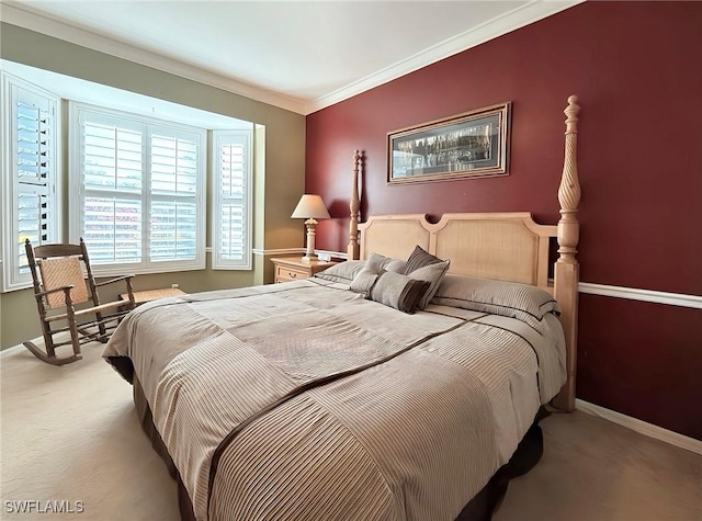 carpeted bedroom with ornamental molding