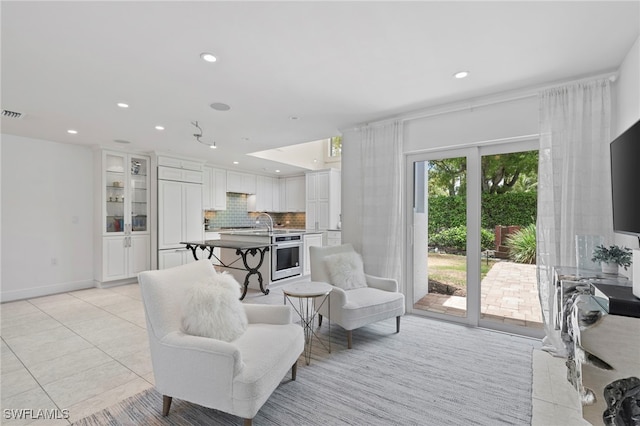 living room featuring light tile patterned flooring