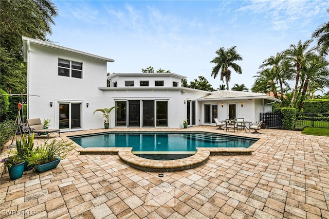 view of swimming pool with a patio area