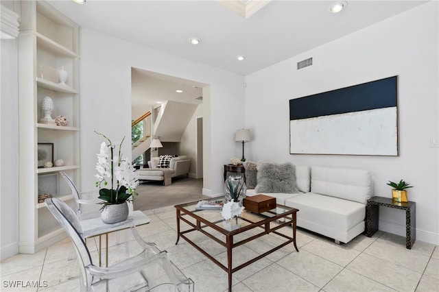 living room with light tile patterned flooring