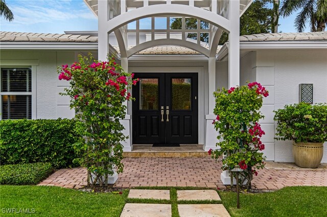 doorway to property with french doors