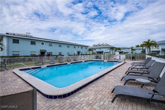 view of pool featuring a patio