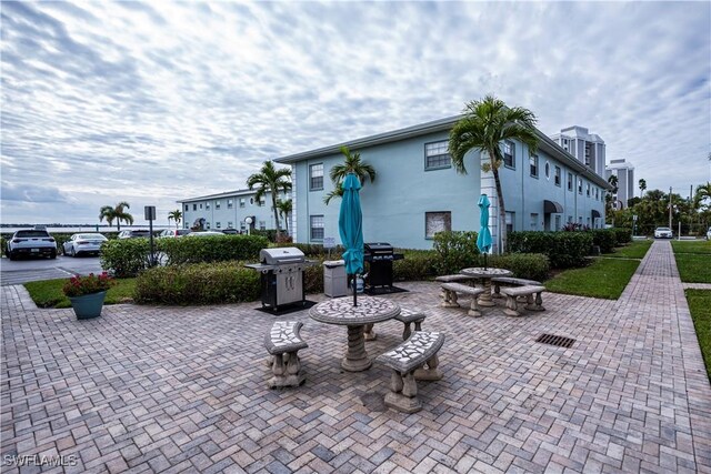 view of property's community featuring a patio area