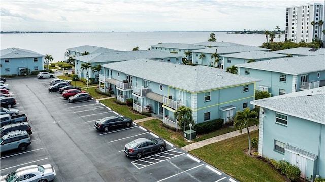 bird's eye view with a water view