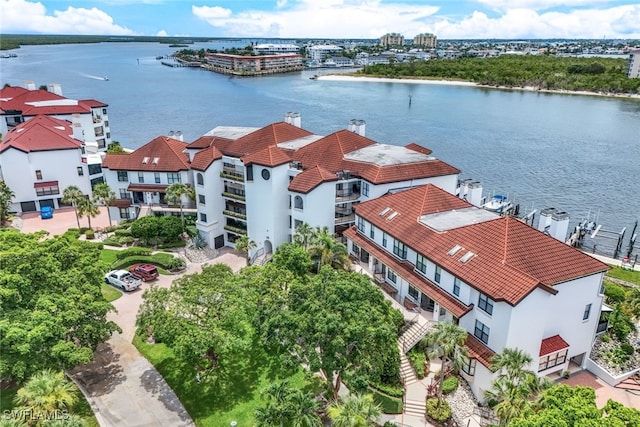 drone / aerial view with a water view