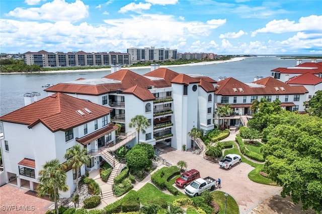 drone / aerial view featuring a water view