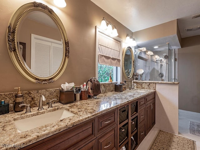 bathroom featuring vanity and tile patterned floors