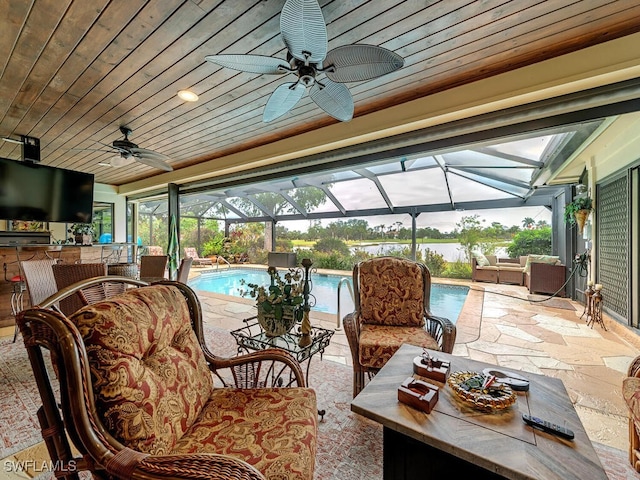 view of patio / terrace featuring ceiling fan, outdoor lounge area, and a lanai