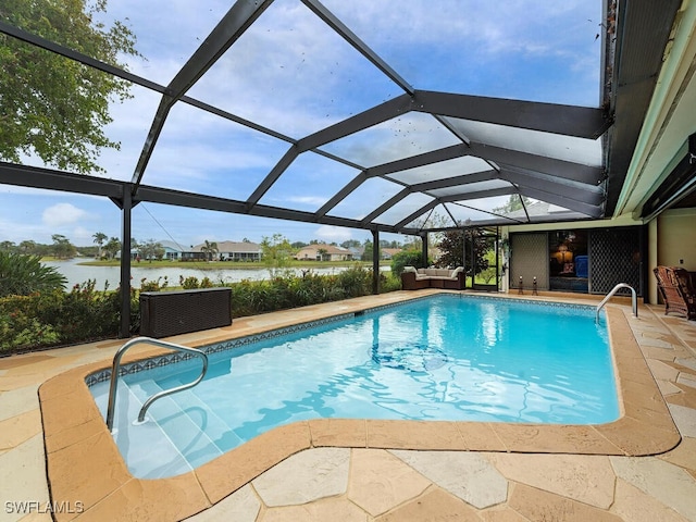 view of swimming pool featuring glass enclosure, a patio area, an outdoor living space, and a water view