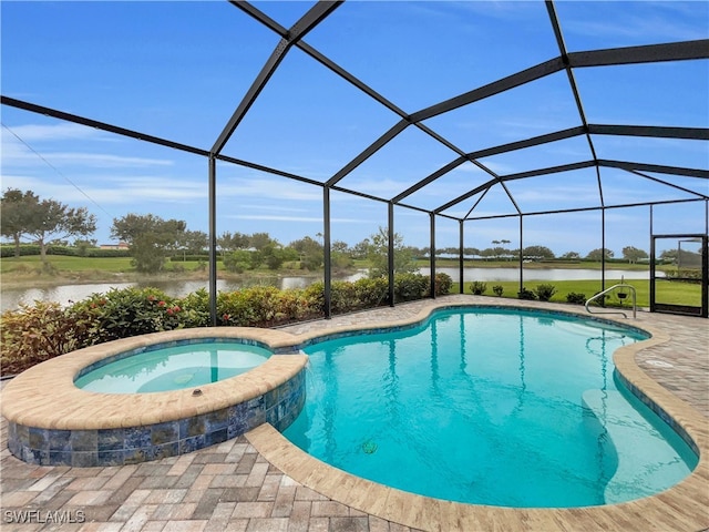 view of swimming pool with glass enclosure, an in ground hot tub, a water view, and a patio