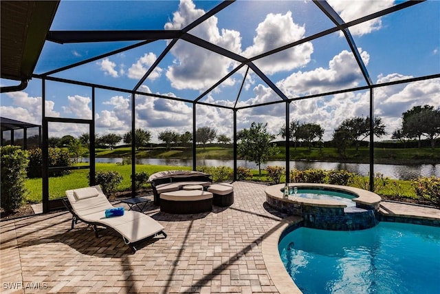 view of swimming pool with a lanai, a water view, an in ground hot tub, and a patio