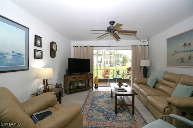 living room with ceiling fan