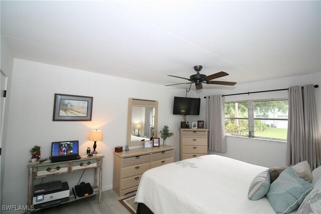 bedroom featuring ceiling fan and light wood-type flooring