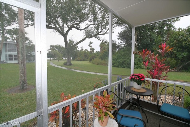 sunroom / solarium featuring plenty of natural light