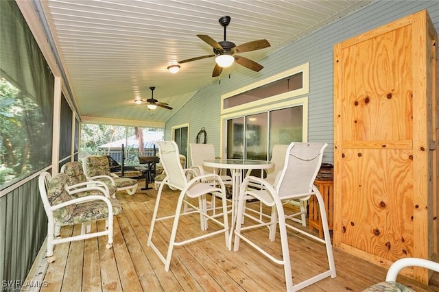 wooden terrace featuring ceiling fan