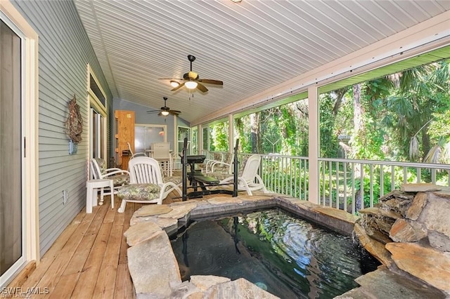 wooden deck with ceiling fan