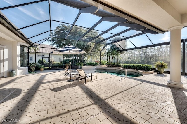 view of patio with a lanai