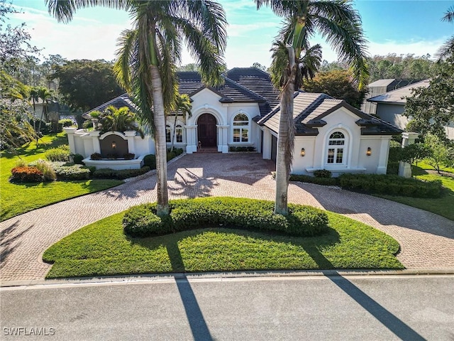 view of front of home with a front lawn