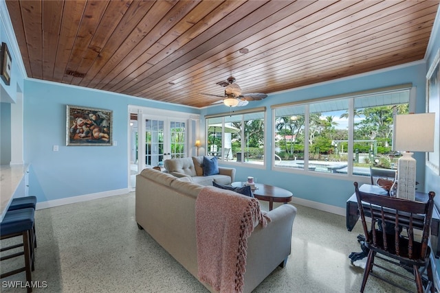 living room featuring wood ceiling, ceiling fan, ornamental molding, and french doors