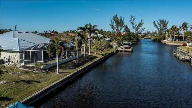 property view of water with a dock