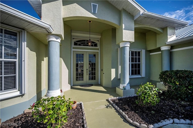 doorway to property featuring french doors