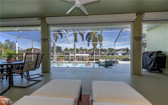 interior space featuring grilling area, glass enclosure, and a pool with hot tub