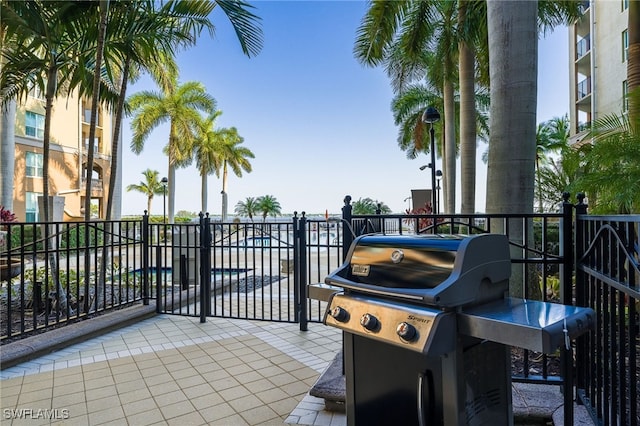 view of patio featuring a grill