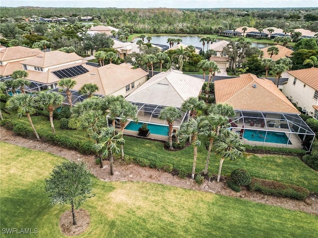 bird's eye view with a water view