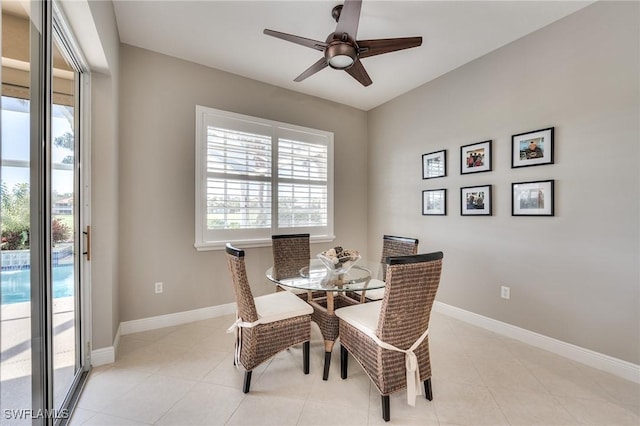 dining space with ceiling fan