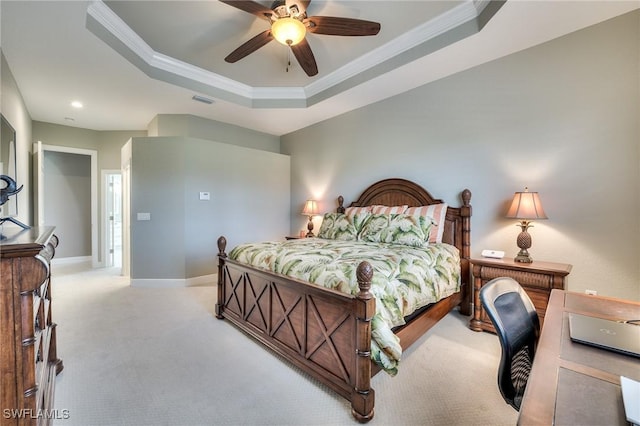 bedroom featuring light carpet, ceiling fan, ornamental molding, and a raised ceiling