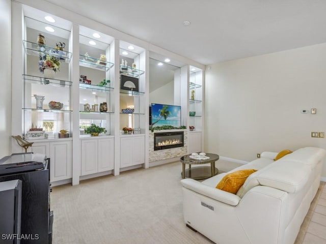 living room featuring built in shelves