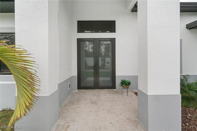 doorway to property featuring french doors