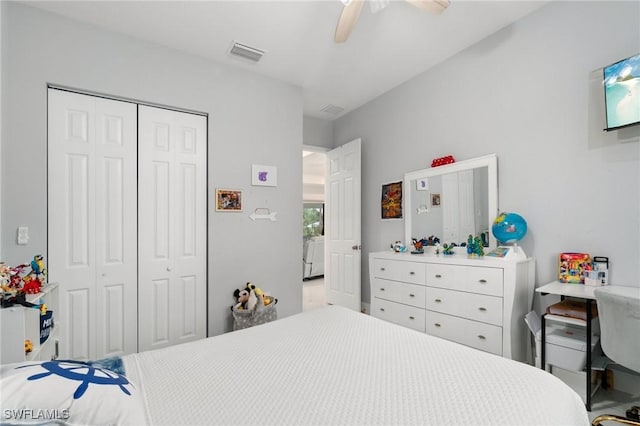 bedroom featuring ceiling fan and a closet