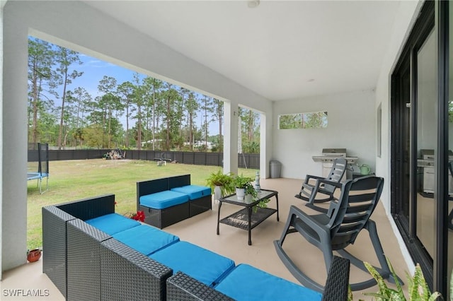 view of patio / terrace with an outdoor hangout area and a trampoline