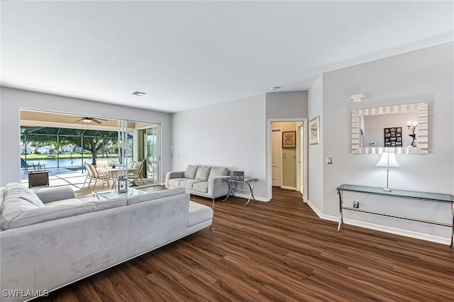 living room with dark wood-type flooring