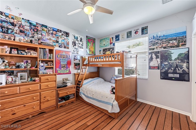 bedroom with hardwood / wood-style floors