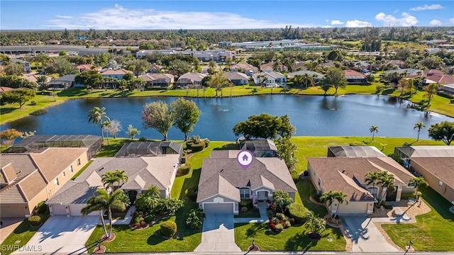 bird's eye view with a water view