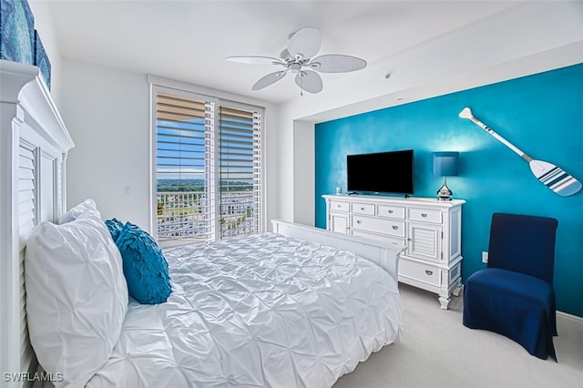 bedroom with ceiling fan, light colored carpet, and access to outside