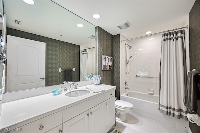 full bathroom with toilet, tile patterned floors, vanity, and shower / tub combo