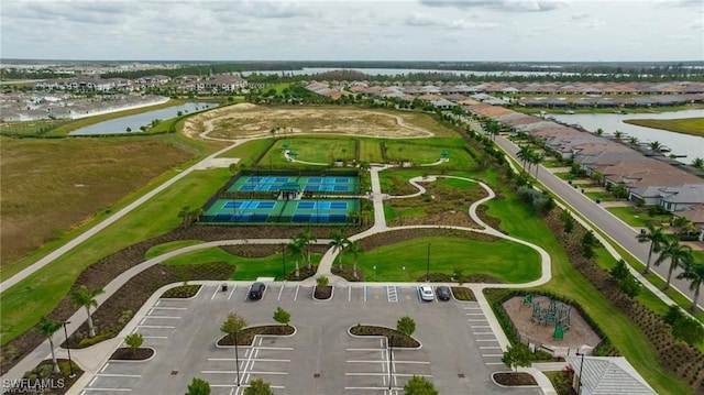 drone / aerial view with a water view