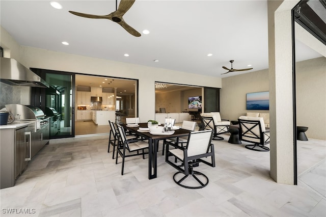 dining space featuring ceiling fan