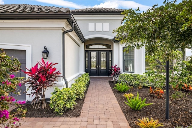 doorway to property with french doors