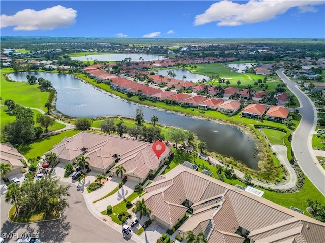 drone / aerial view with a water view