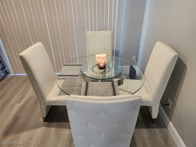 dining room featuring hardwood / wood-style flooring