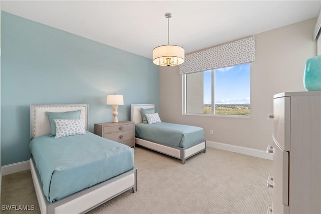 bedroom featuring light colored carpet