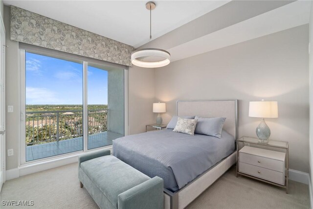 bedroom featuring light colored carpet